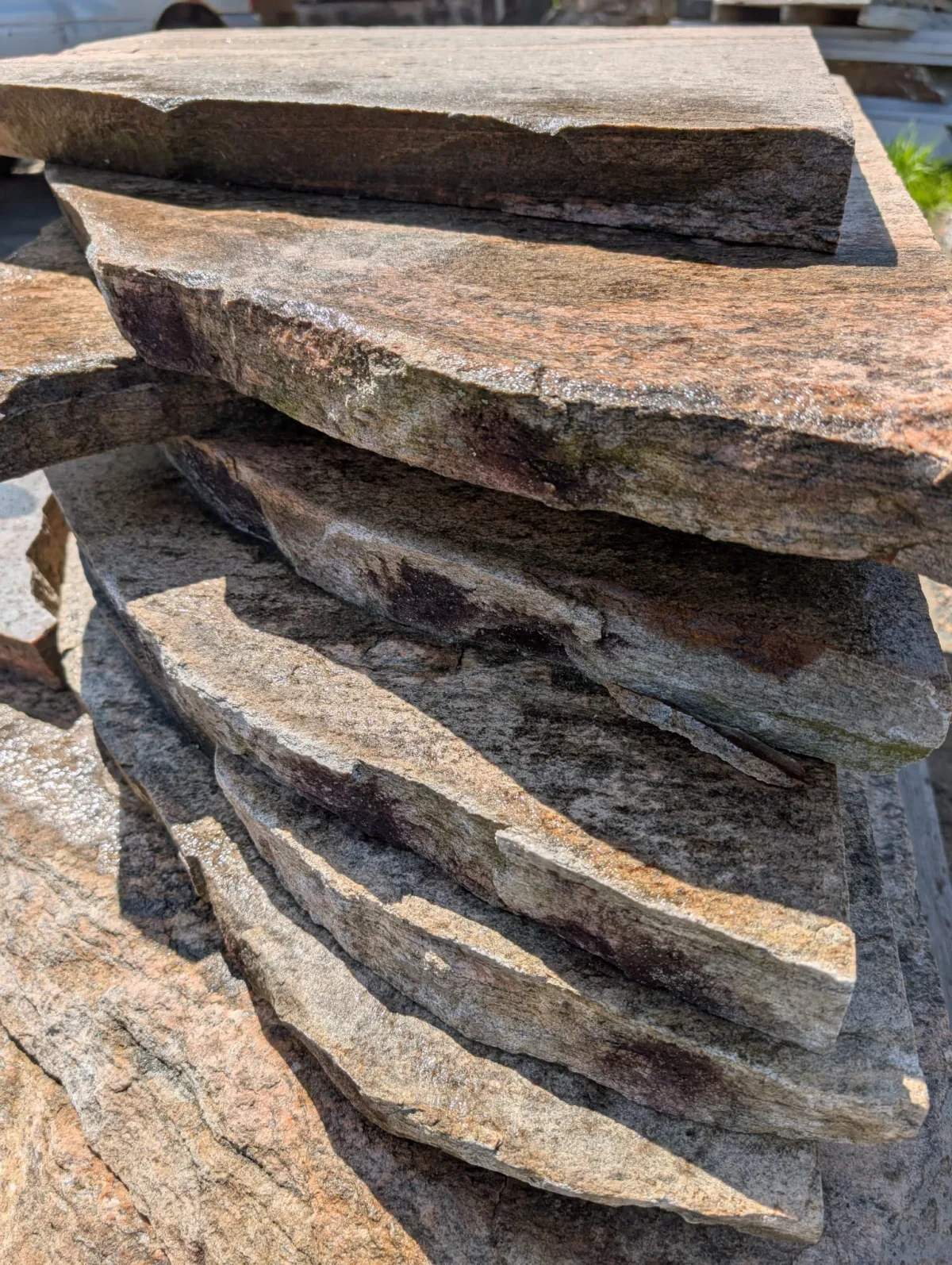 Kyle Madracki setting a point against the grain of a granite block